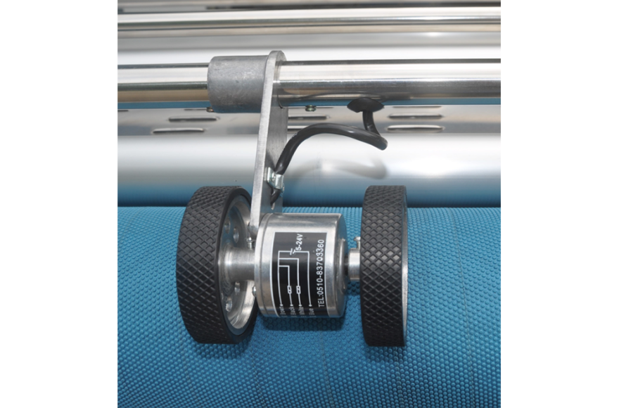 富怡吹風(fēng)式自動(dòng)對(duì)邊松布機(jī)